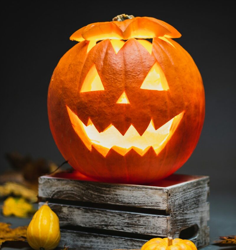 jack o lantern on brown wooden table